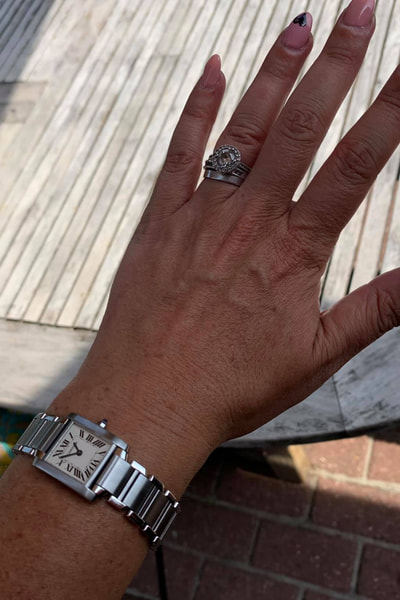 bernice reviewer hand with silver ring and watch